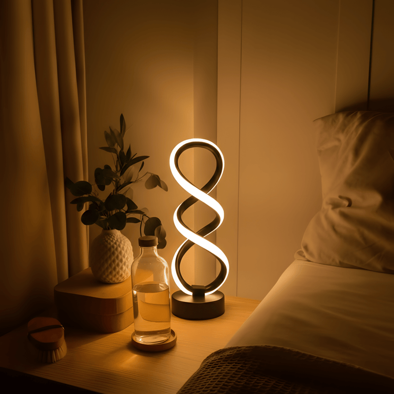 SoftRay ambient lamp beside a bed