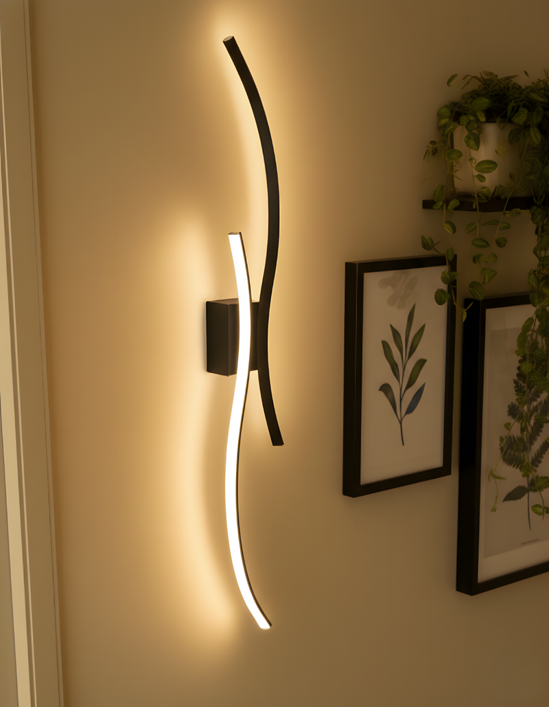 HaloLine wireless wall light beside a bed