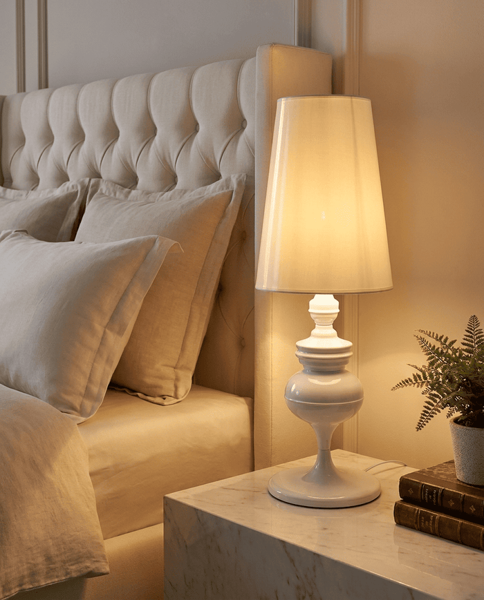 NoireRoyale lamp by upholstered headboard