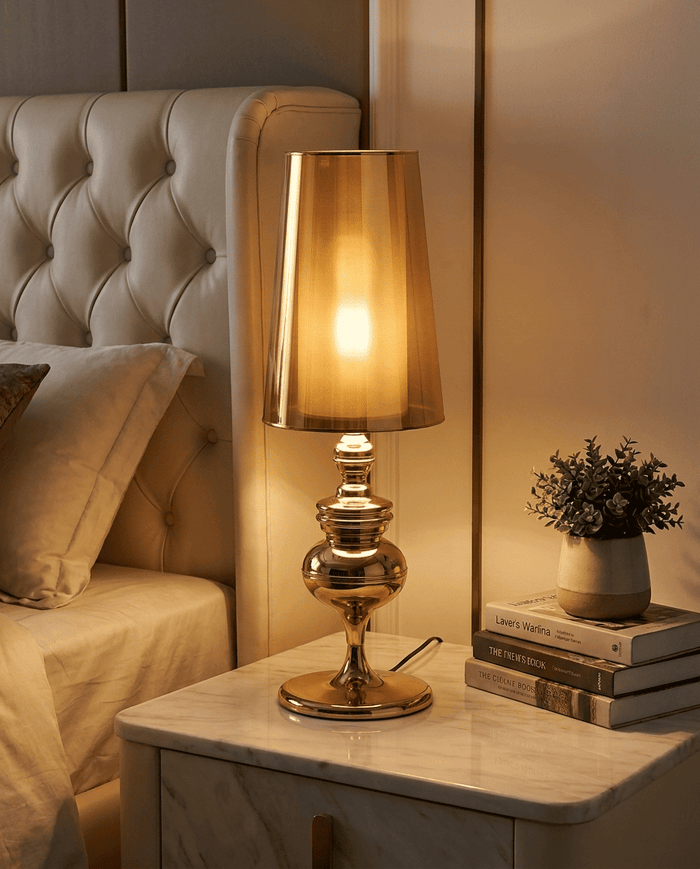 NoireRoyale lamp on bedside table, warm light