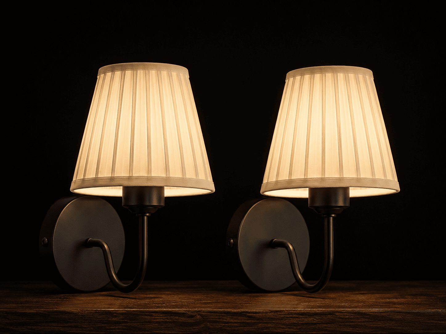 Matched set of two matte-black GildGlow cordless wall sconces