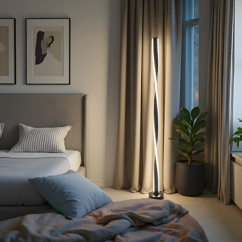 Helix Glow floor lamp beside a bed